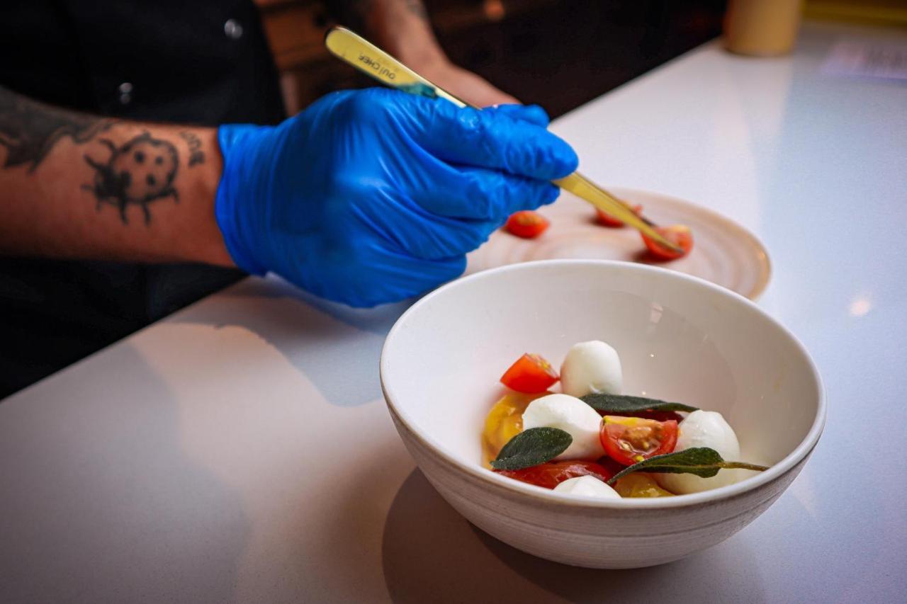 Lion & Swan Hotel Congleton Esterno foto Chef preparing a salad